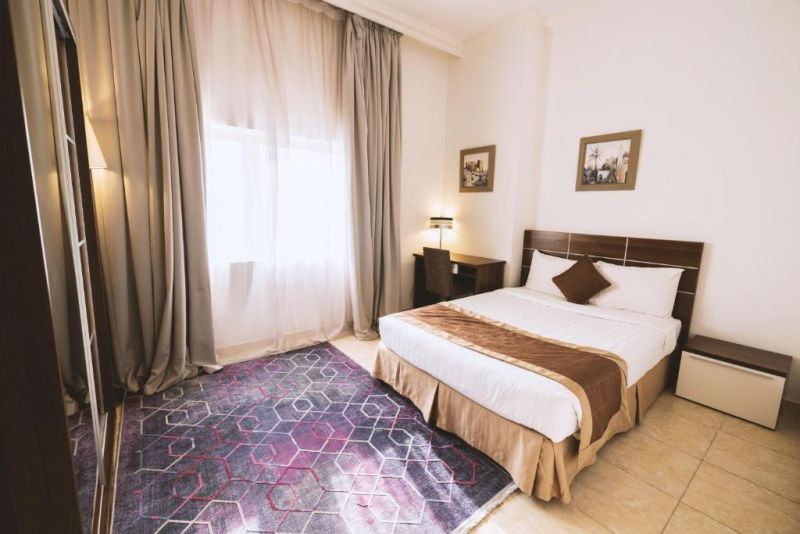 MAGNUM HOTEL & SUITES WEST BAY